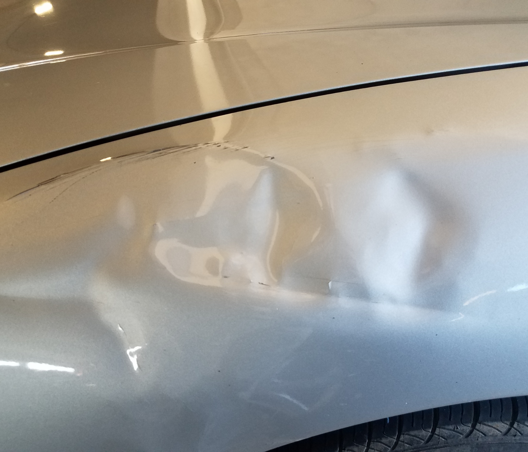 Car dent before repair